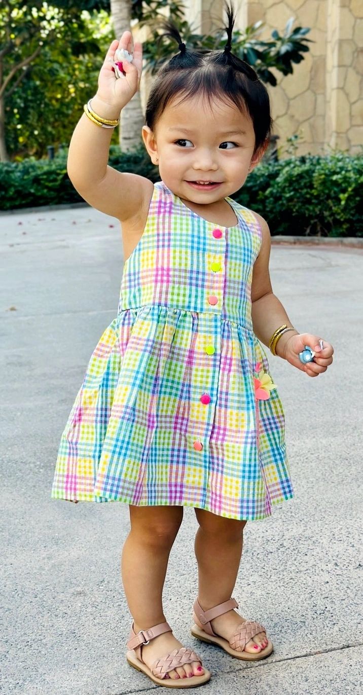 A smiling toddler at Kopila